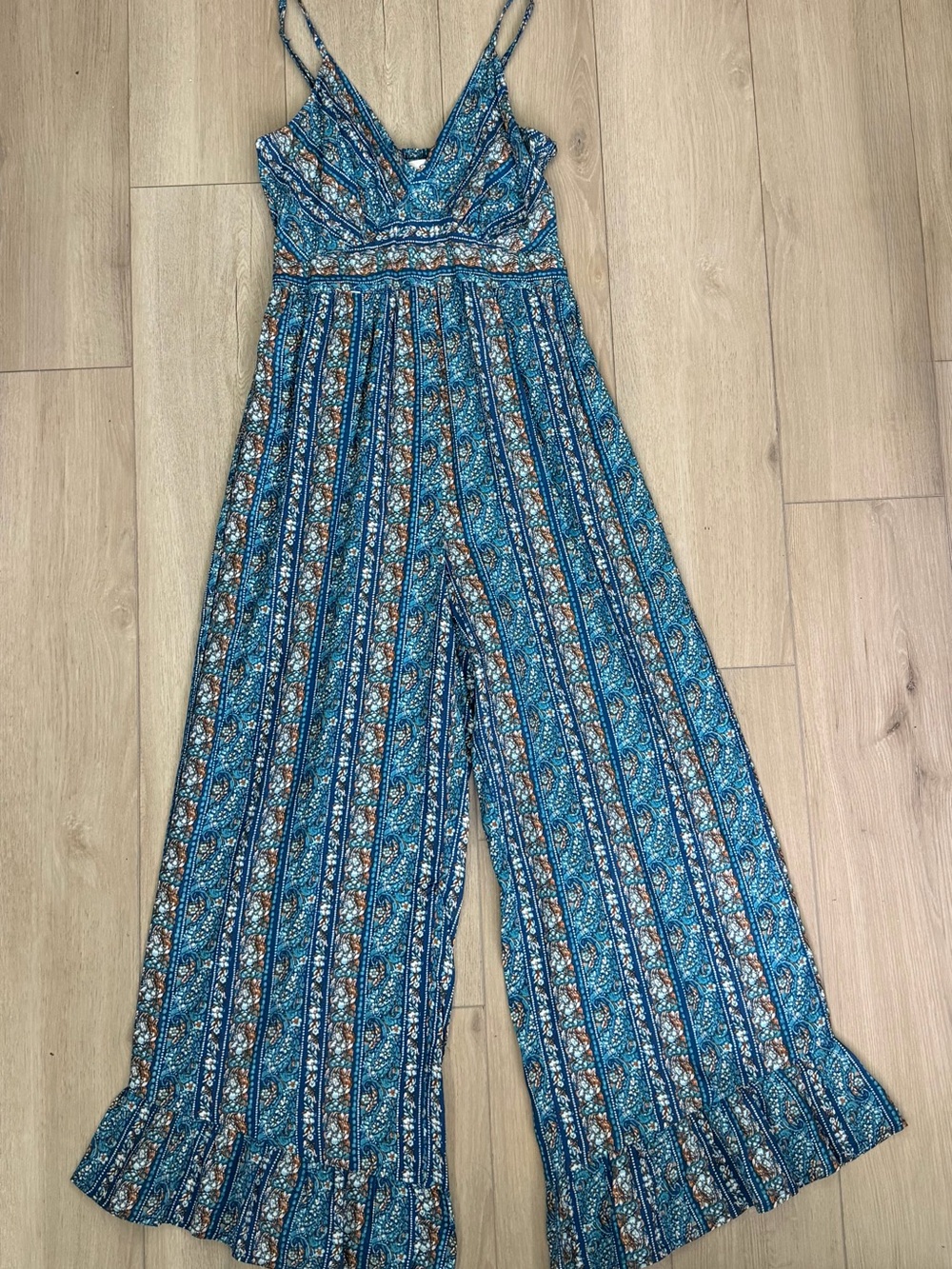 Jessica Simpson wide leg jumpsuit with floral print and ruffles on the ankles